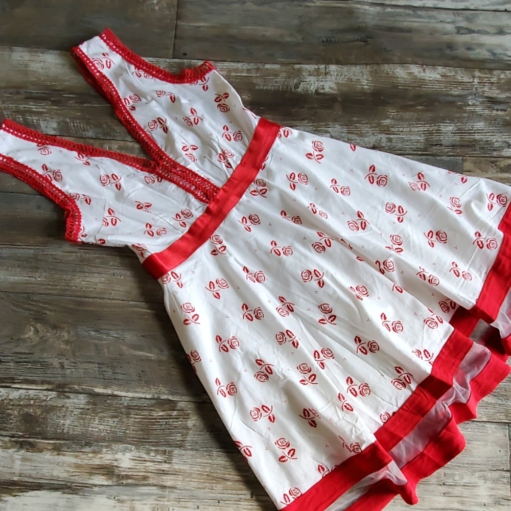 La Reyna dress size large (fits up to size 10)